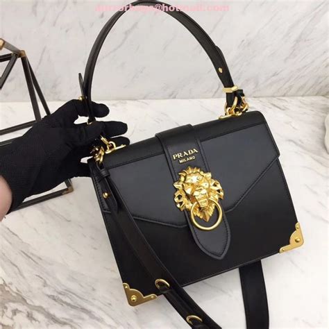 prada lion head bag replica